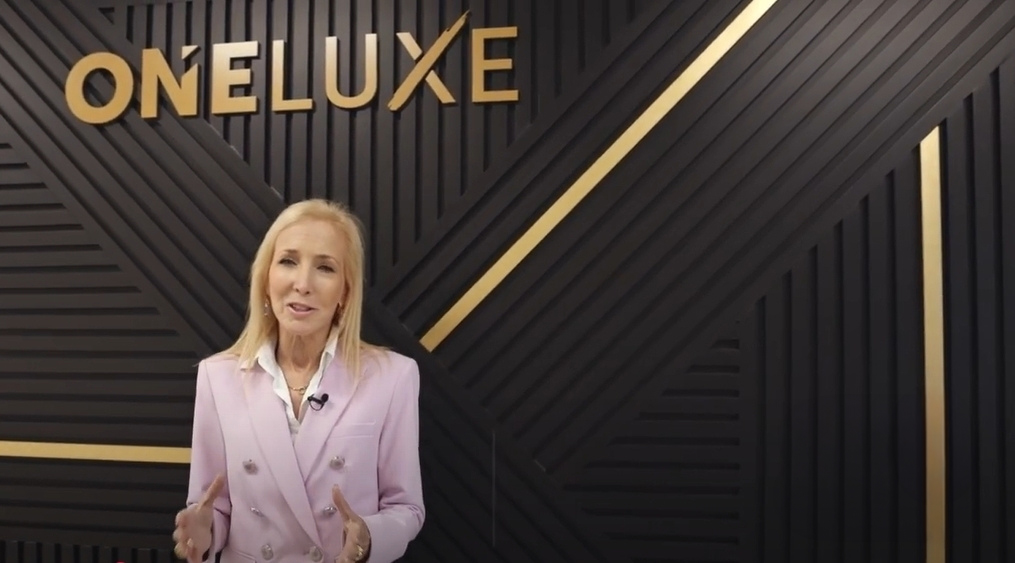 ONE LUXE professional presenting the luxury real estate brand